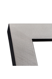 Scratched, shiny silver, black lining